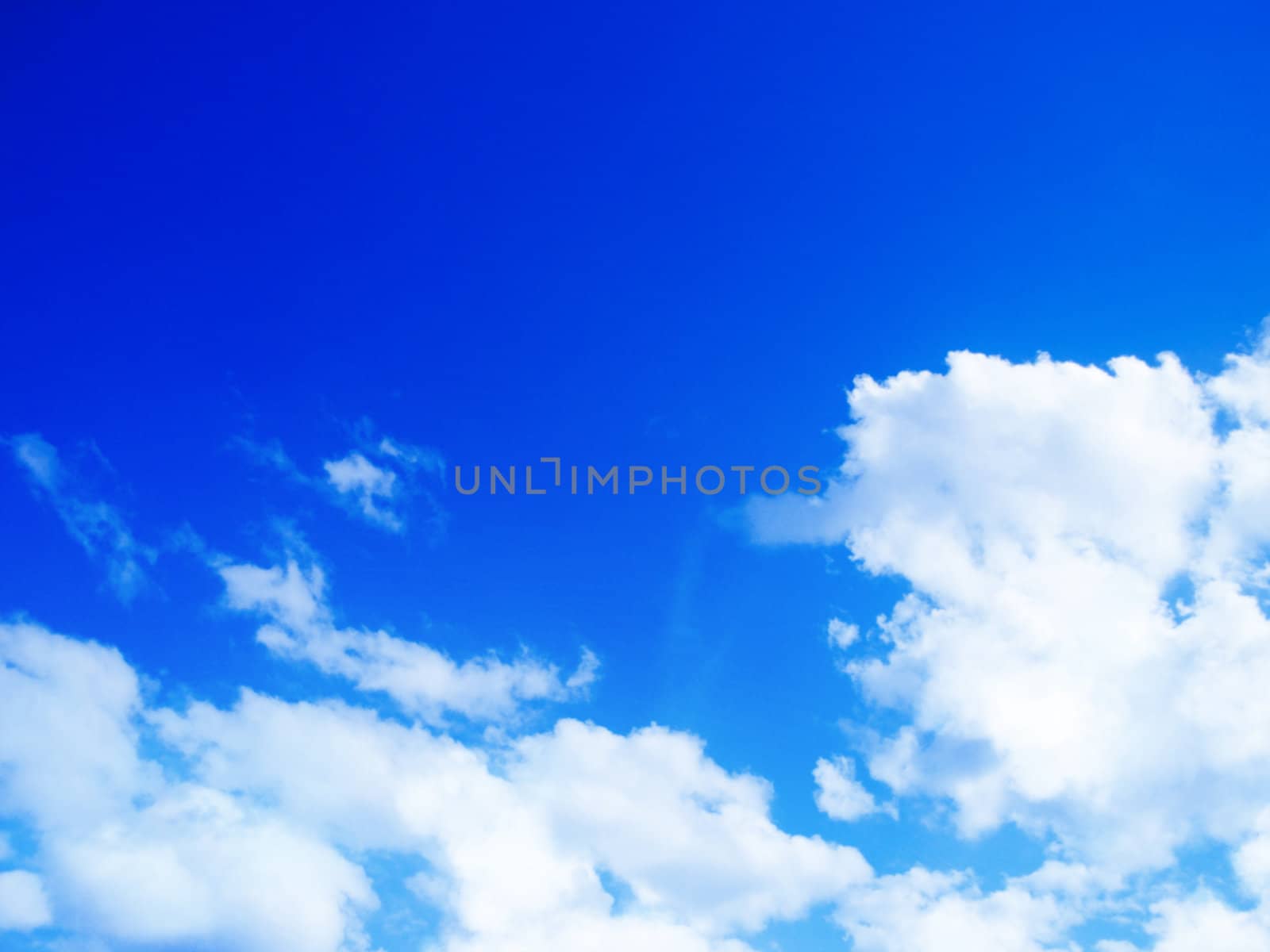 Blue sky with clouds and sun  