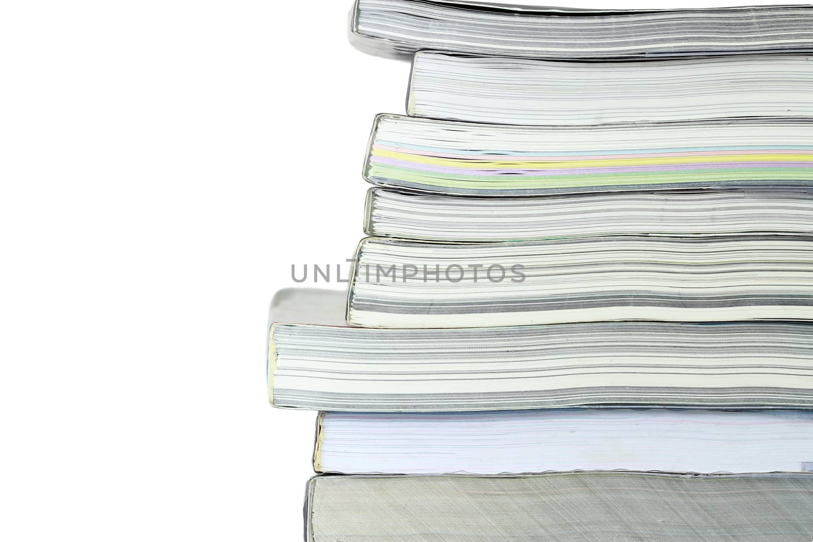 Stack of books on white background, partial view. by bajita111122