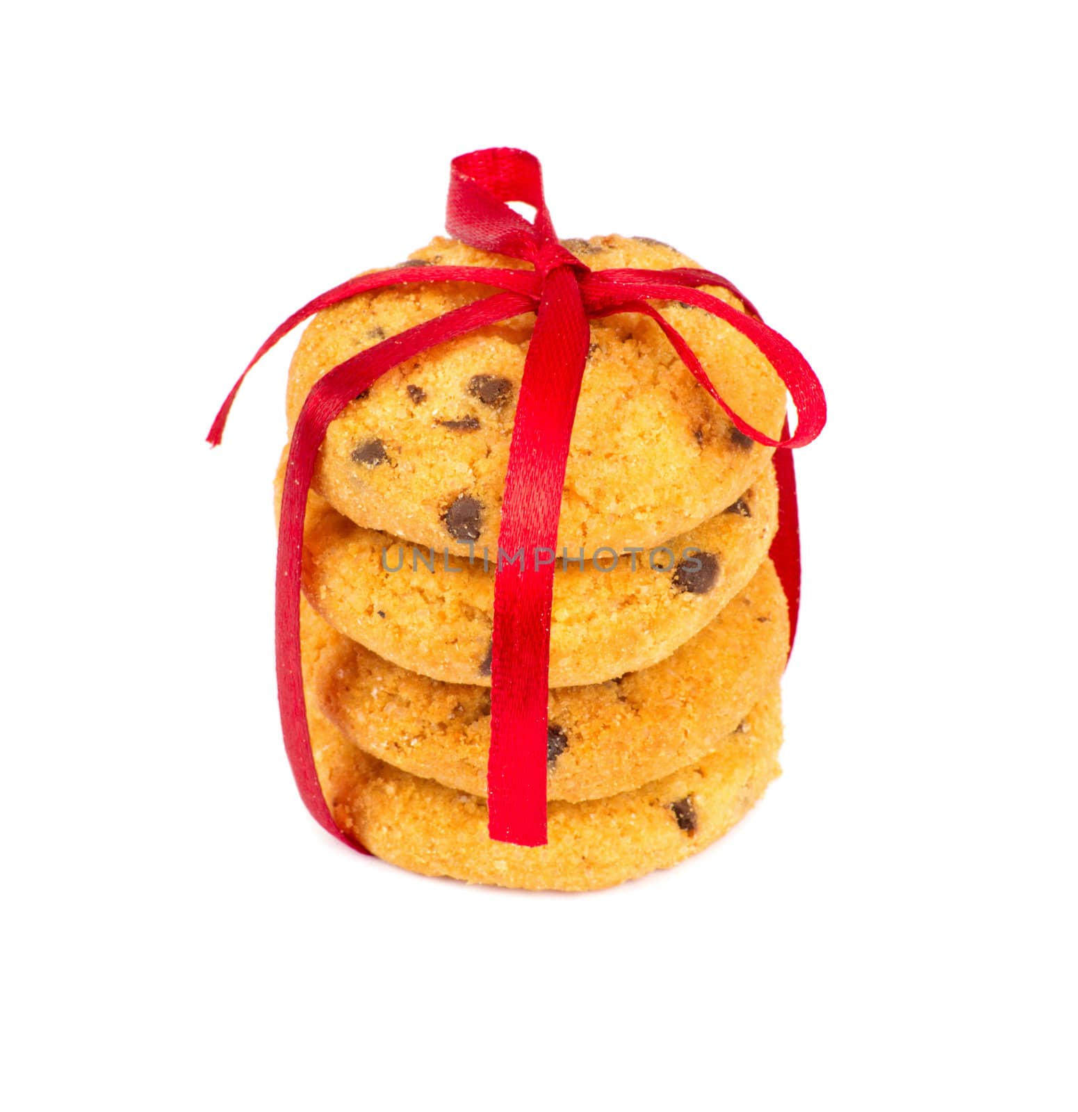 Chocolate chips cookies with red ribbon isolated on white