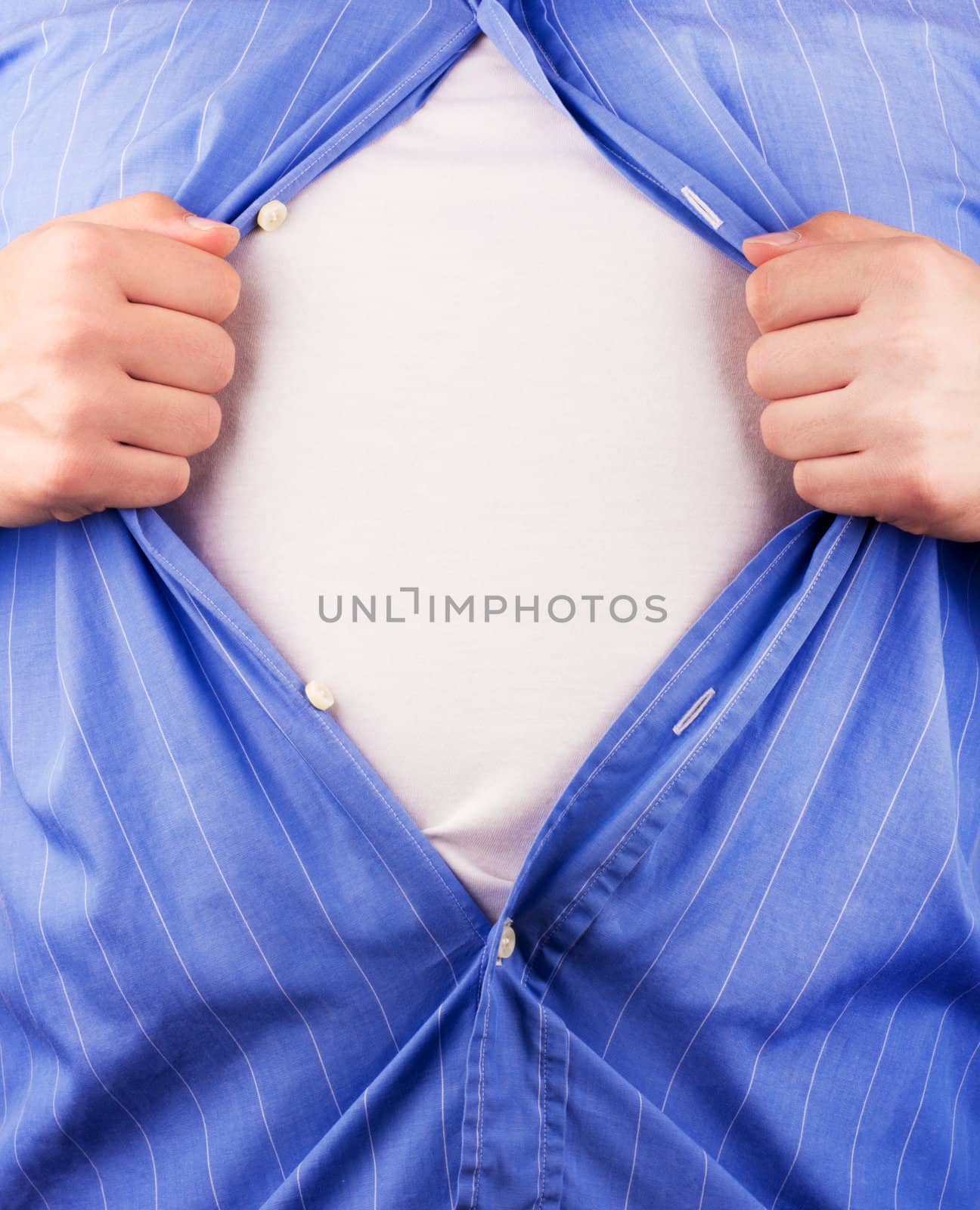 Cropped view of frustrated business man tearing off his shirt