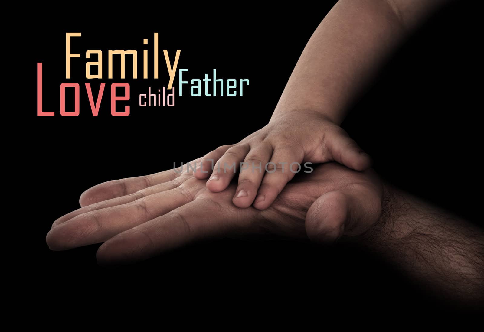 baby hand with father's hand