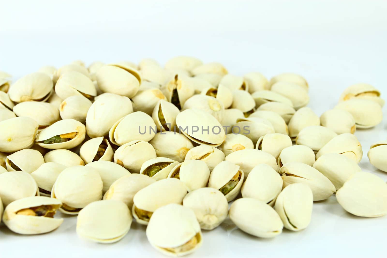 large group of shelled pistachio.