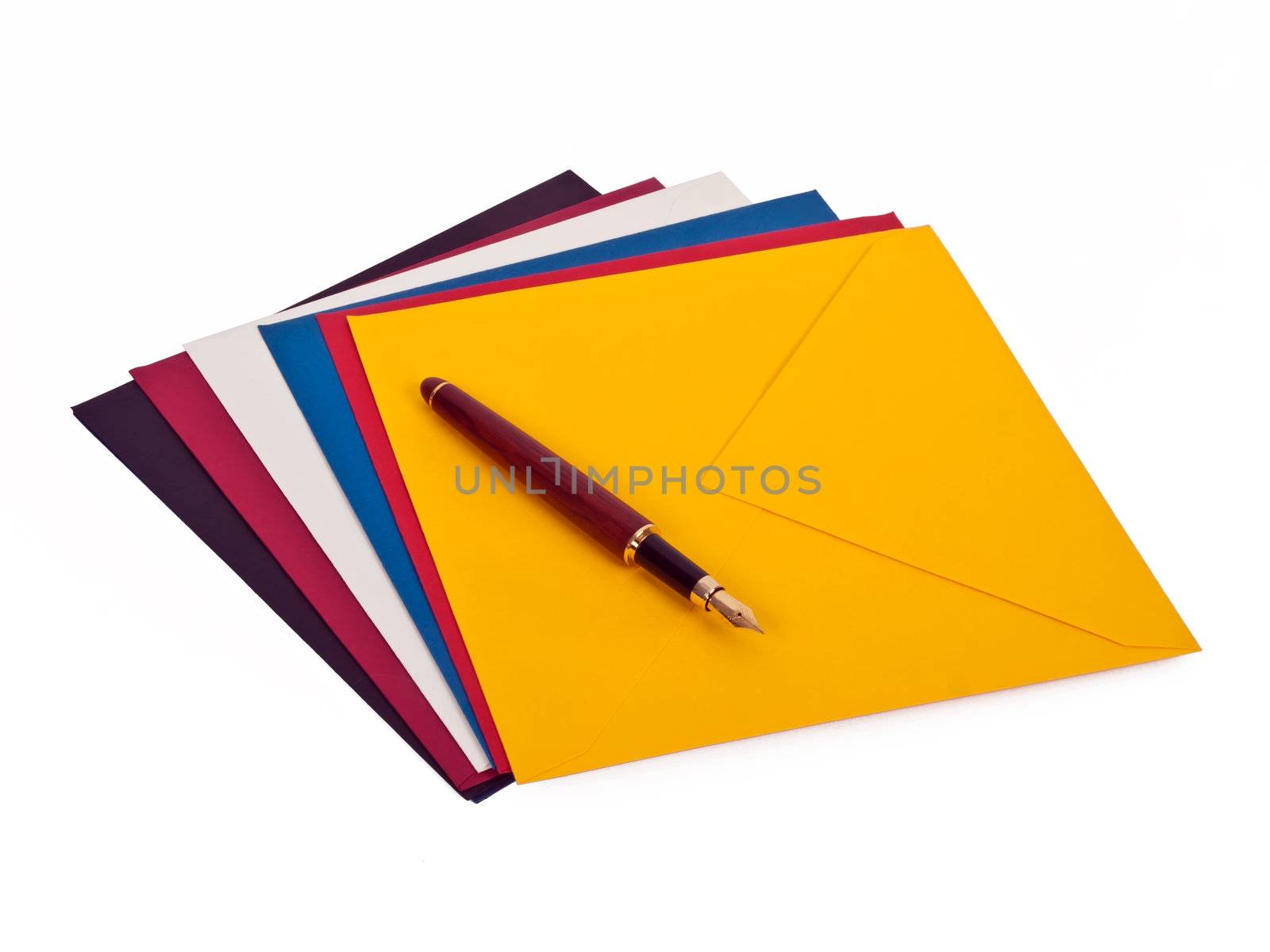 fountain pen and colorful envelops isolated on white background