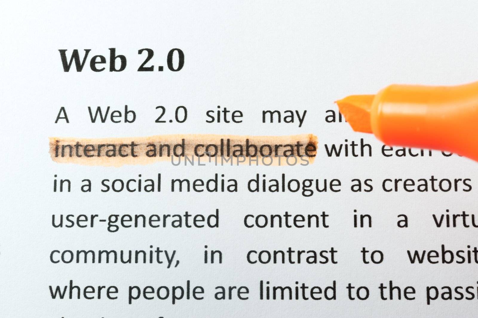 Highlighter and web 2.0 concept words on paper