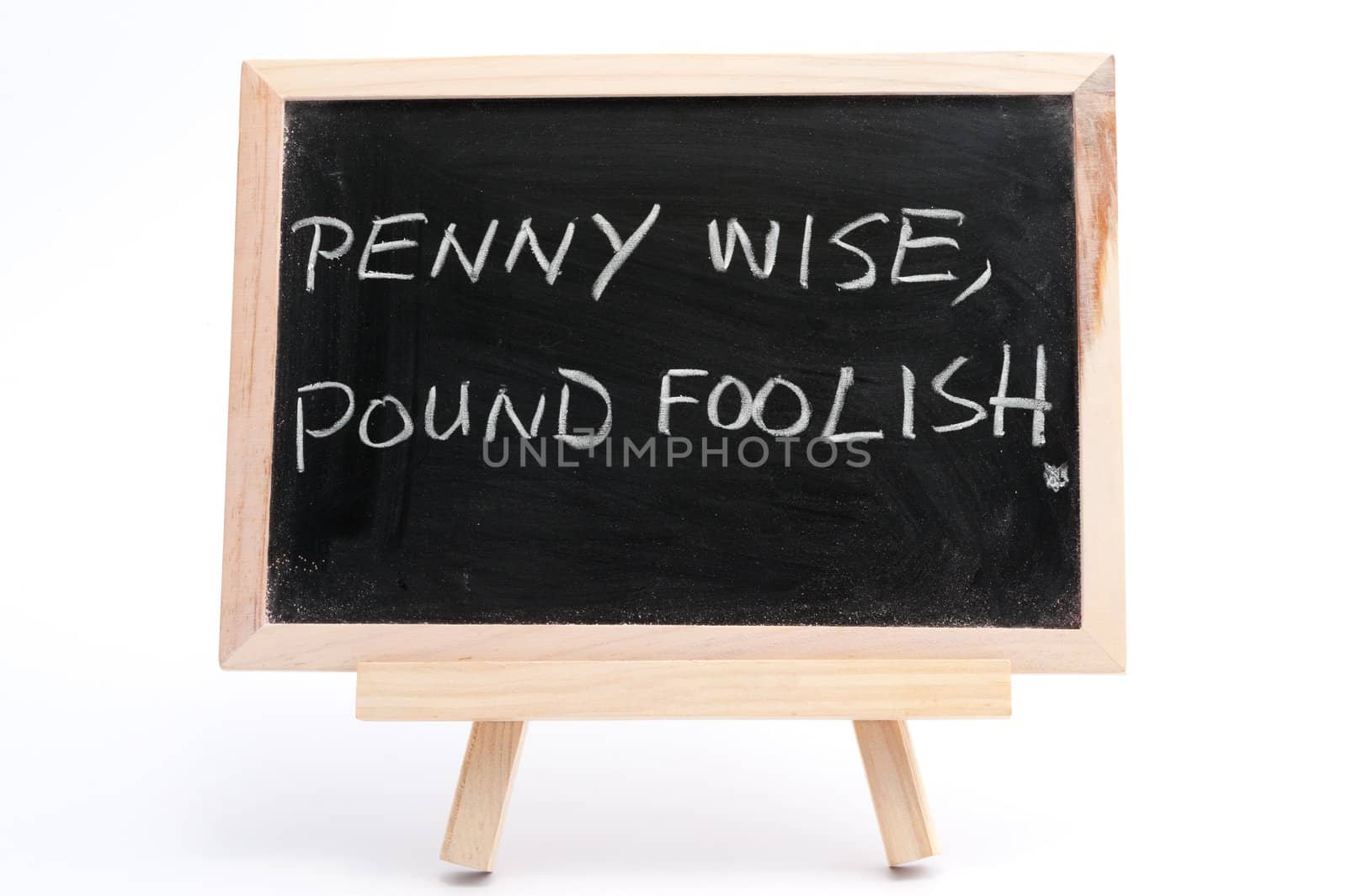 "Penny wise, pound foolish" saying written on blackboard over white background
