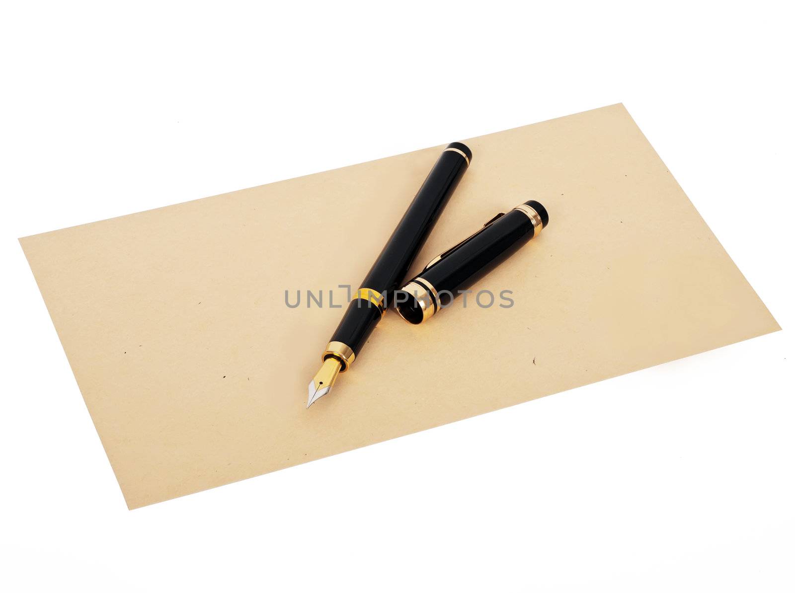 black fountain pen on beige envelope