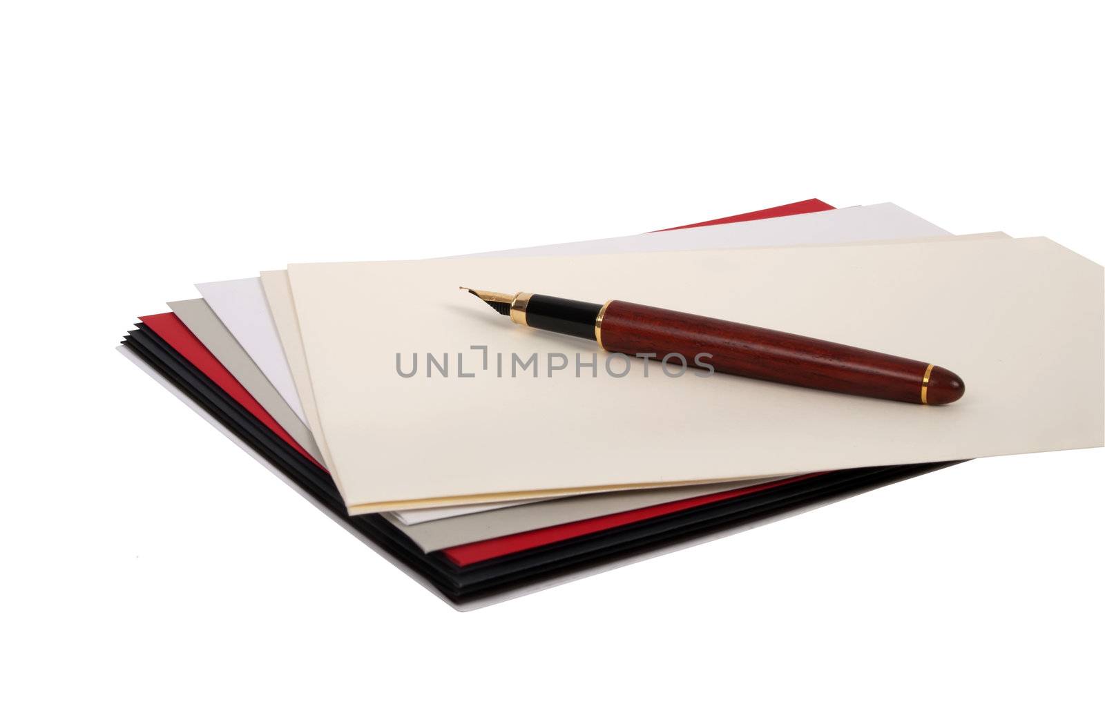 Envelops and fountain pen isolated on white background