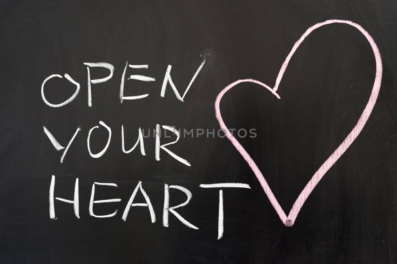 Open your heart concept drawn on chalkboard