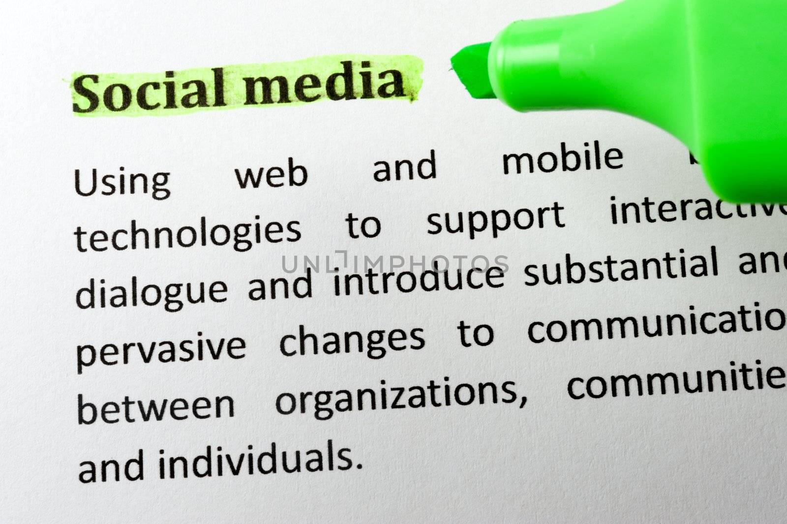 Social media item on paper with a highlighter