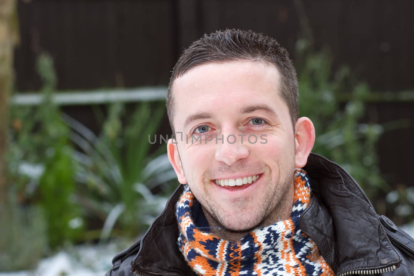 winter portrait of a smiling man by smikeymikey1