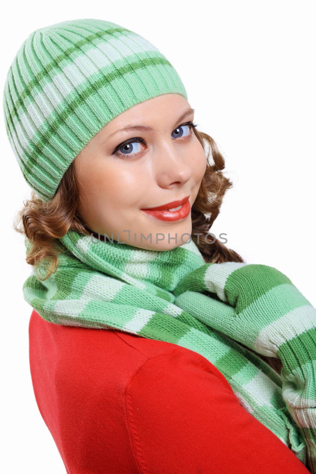 Young woman wearing winter hat and warm scarf by sergey_nivens