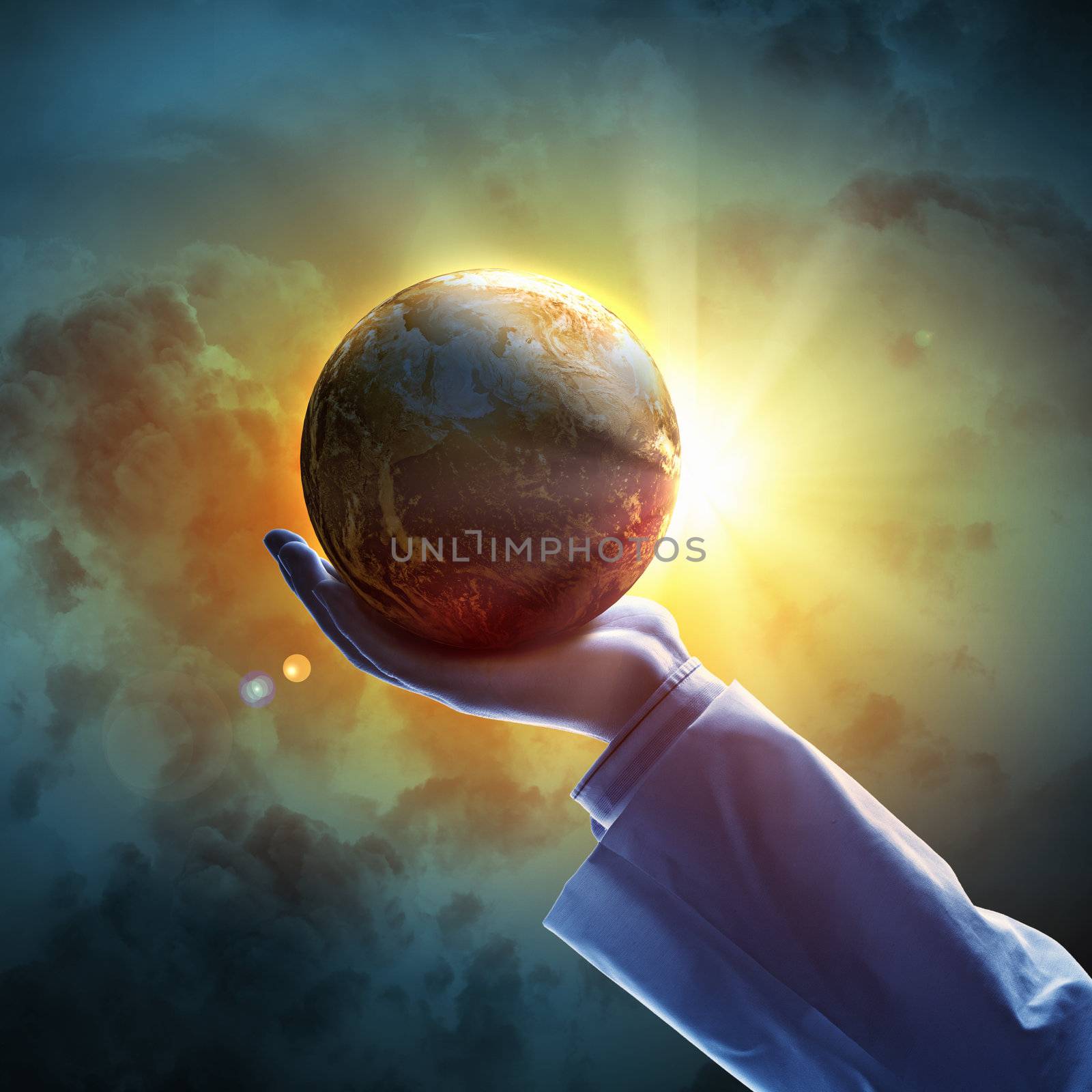 Image of earth planet on hand by sergey_nivens