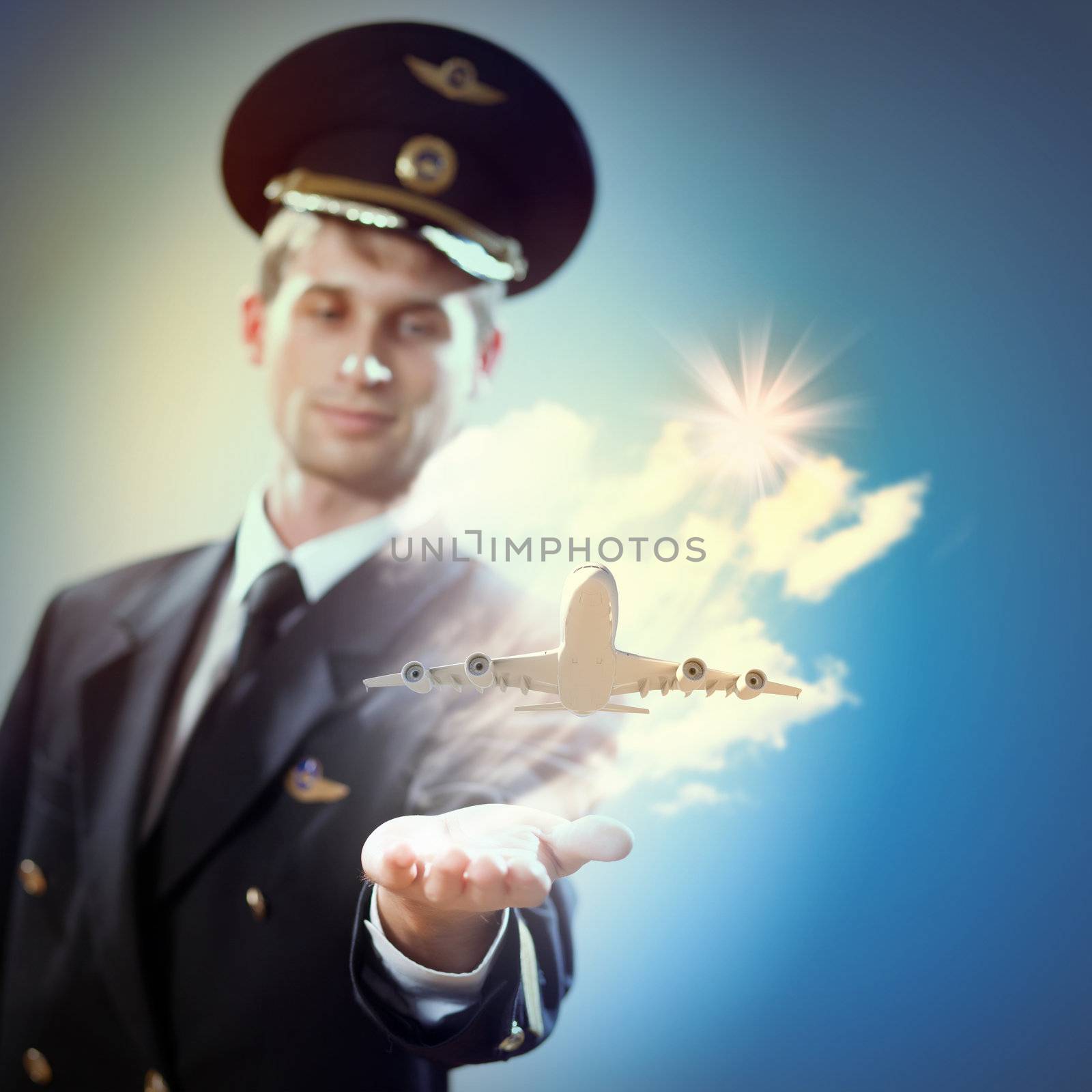 Image of pilot with plane in hand by sergey_nivens