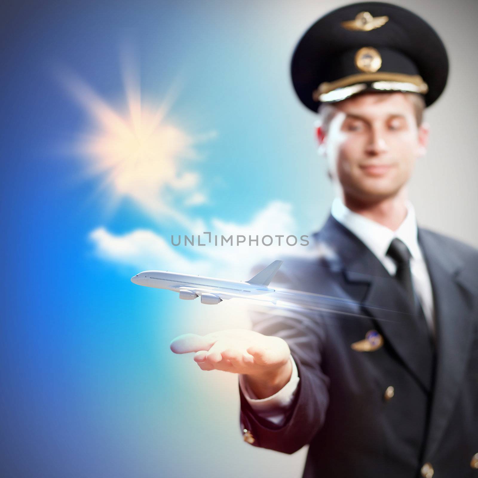 Image of pilot with plane in hand by sergey_nivens