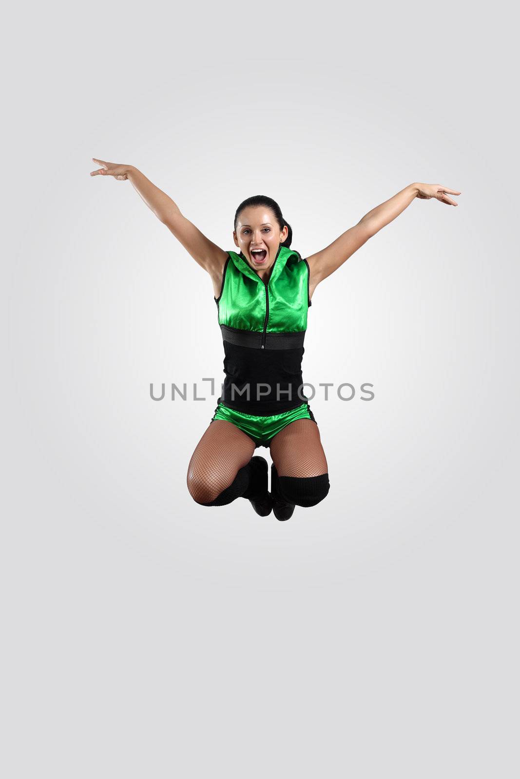 Young female dancer against white background by sergey_nivens