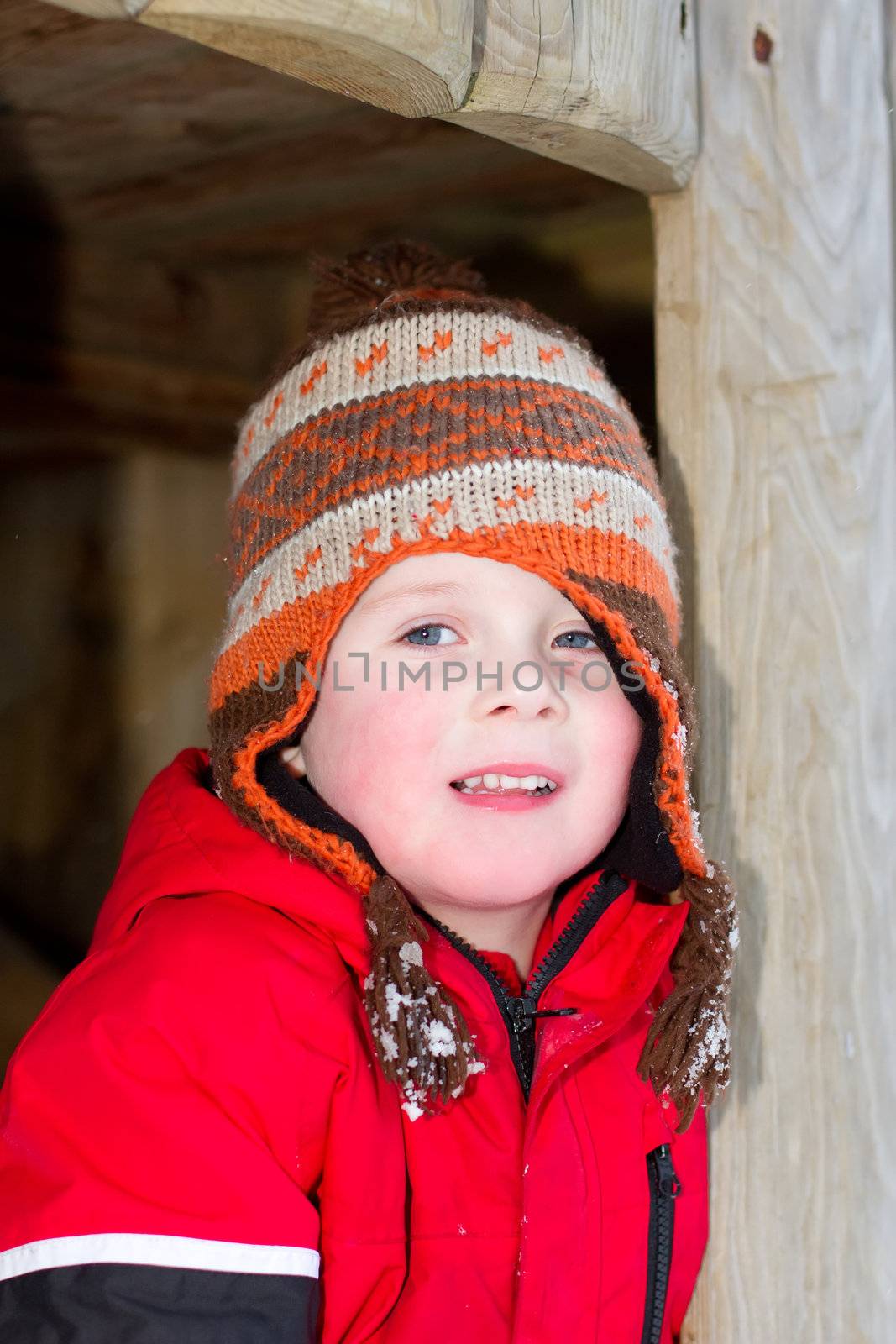 young boy smiling in the snow by smikeymikey1