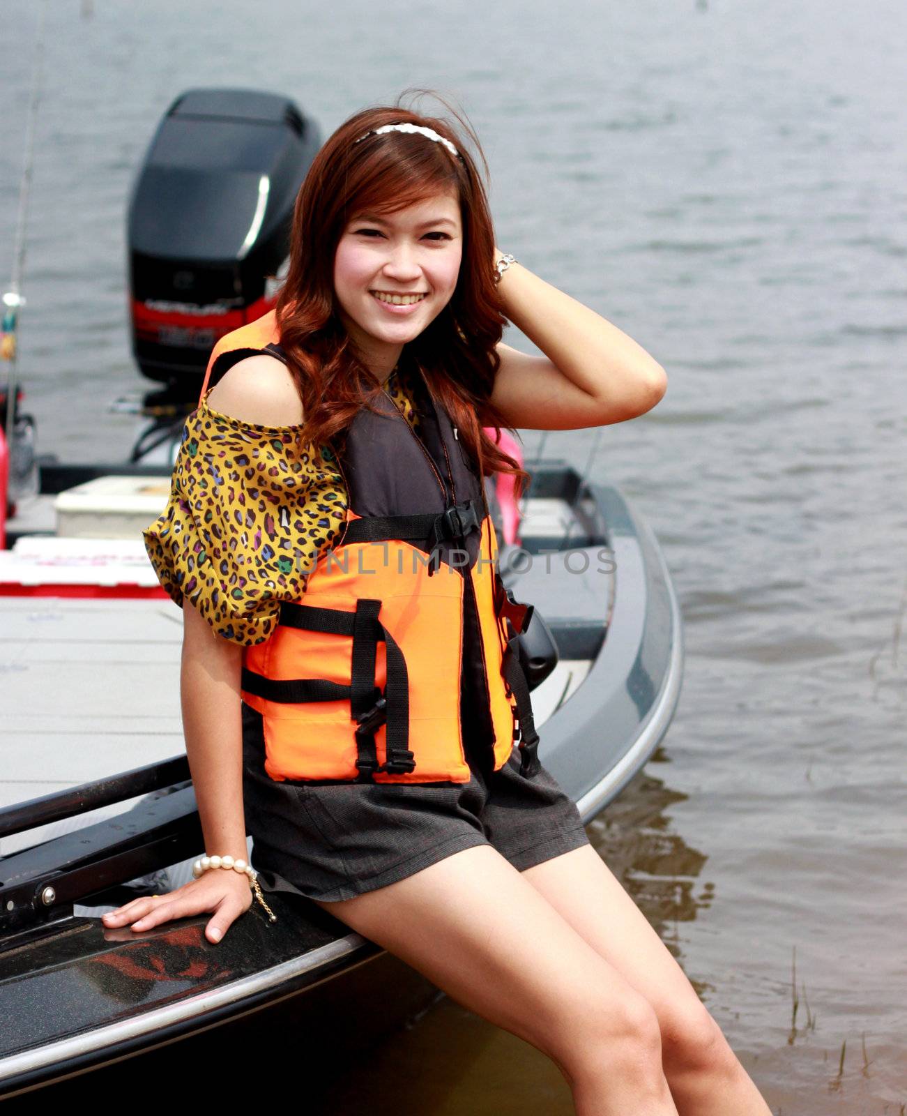 women on the boat in river