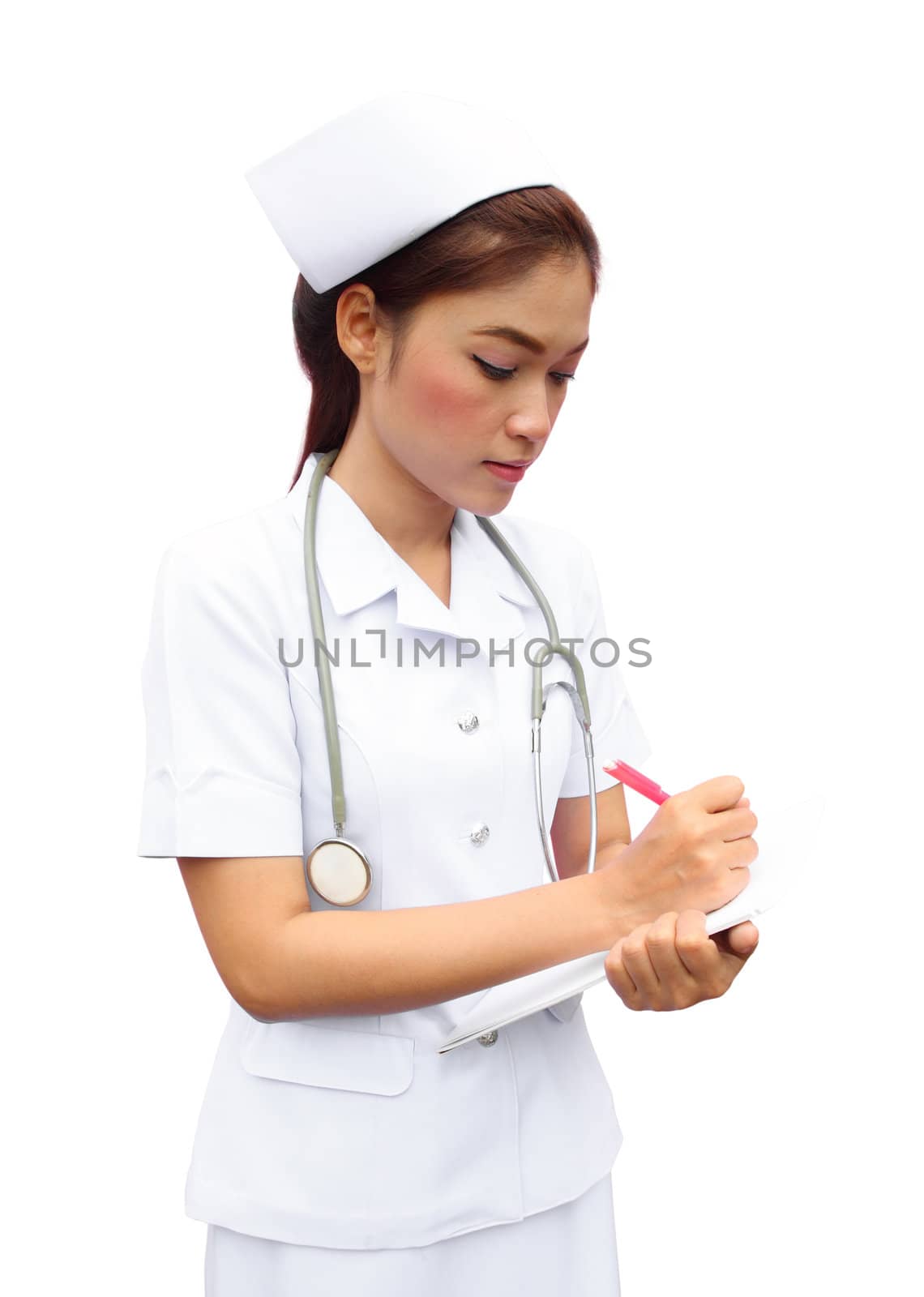 Asian female nurse writing medical report on white background