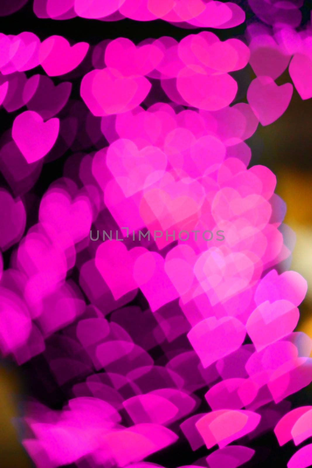 pink hearts bokeh as background