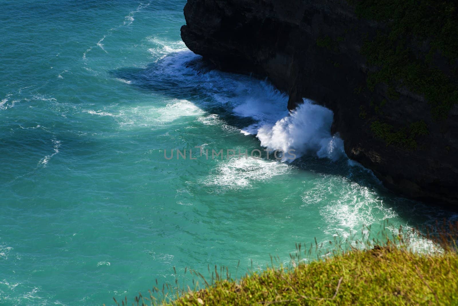 Rock sea and wave at Pura Uluwatu temple, Bali, Indonesia