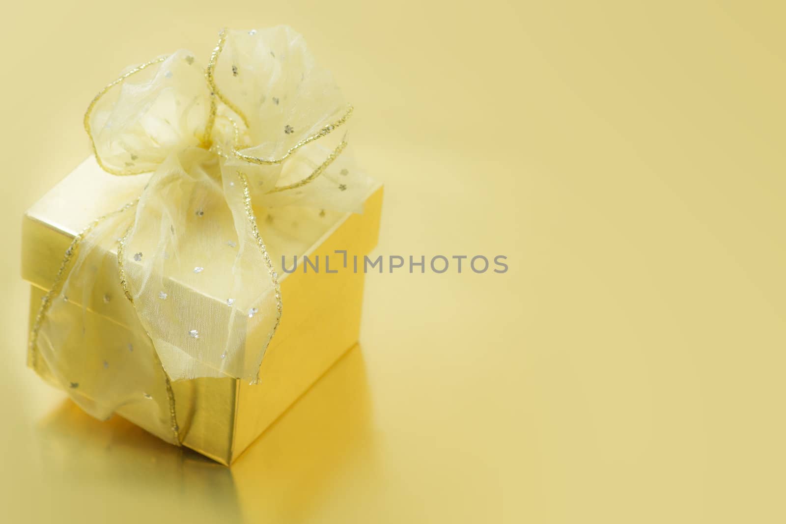 Gold Present Holiday Background by sketchyT