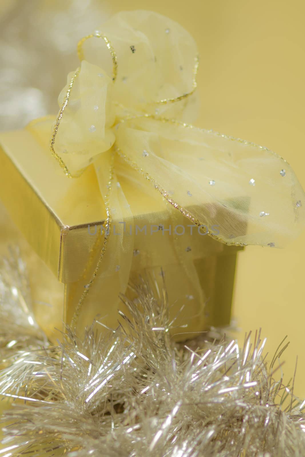 Gold Present Holiday Background by sketchyT