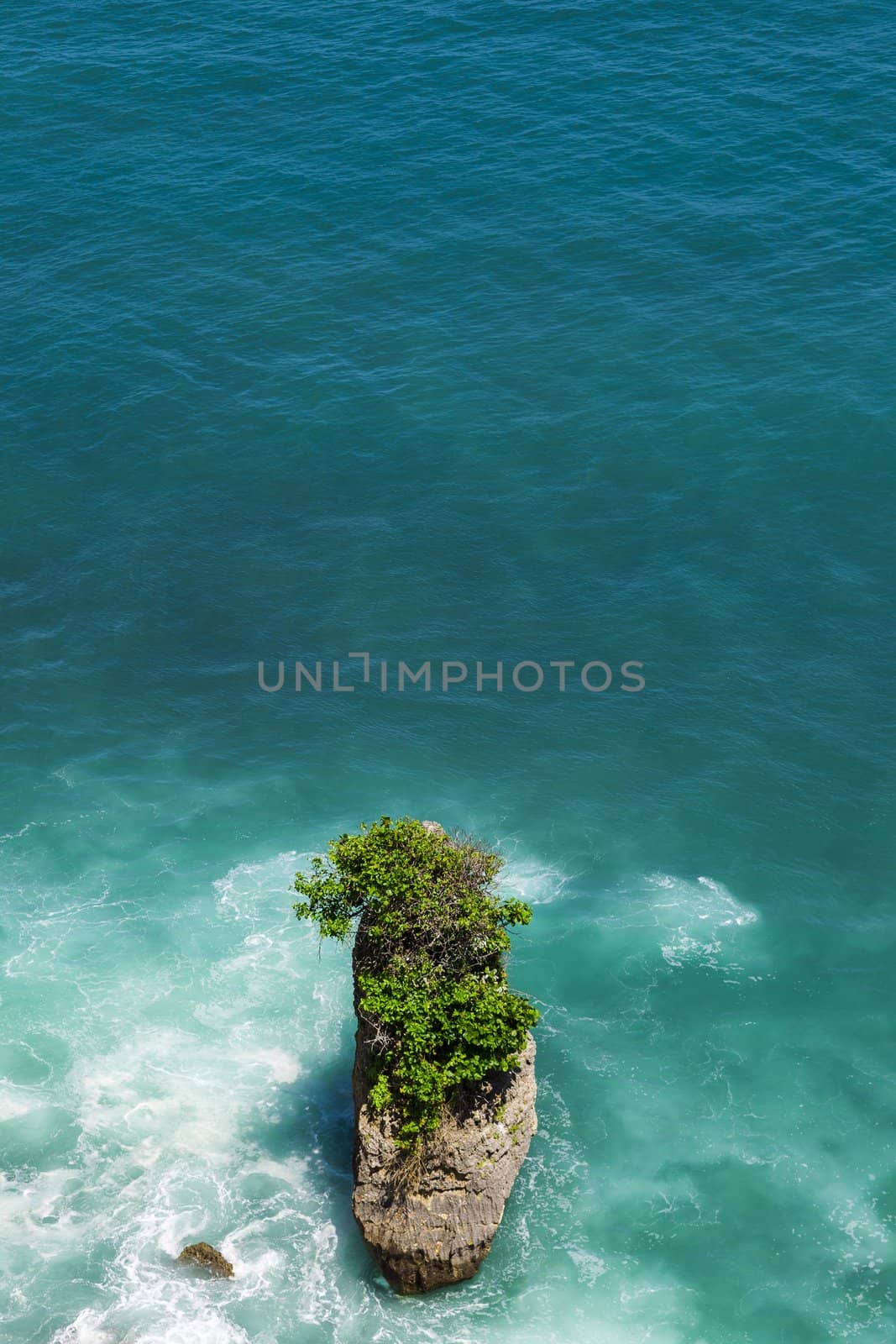 Rock sea and wave at Pura Uluwatu temple, Bali, Indonesia