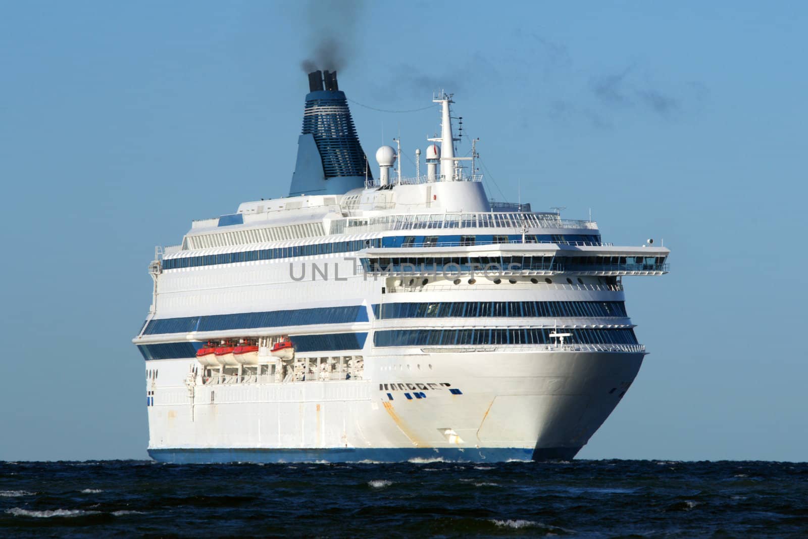 White ferry on a background of the blue sky