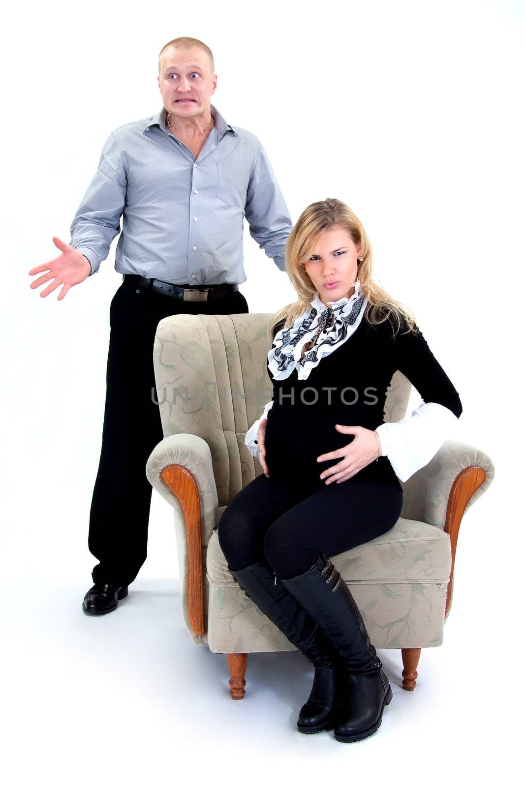 Husband and his pregnant wife make faces