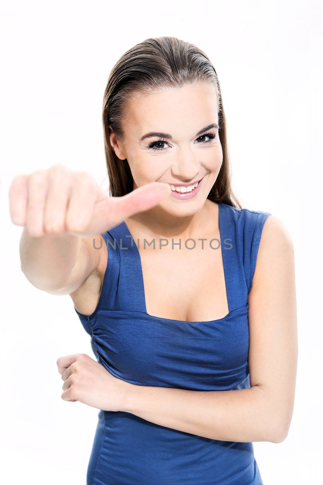Beautiful girl shows a sign on a white background