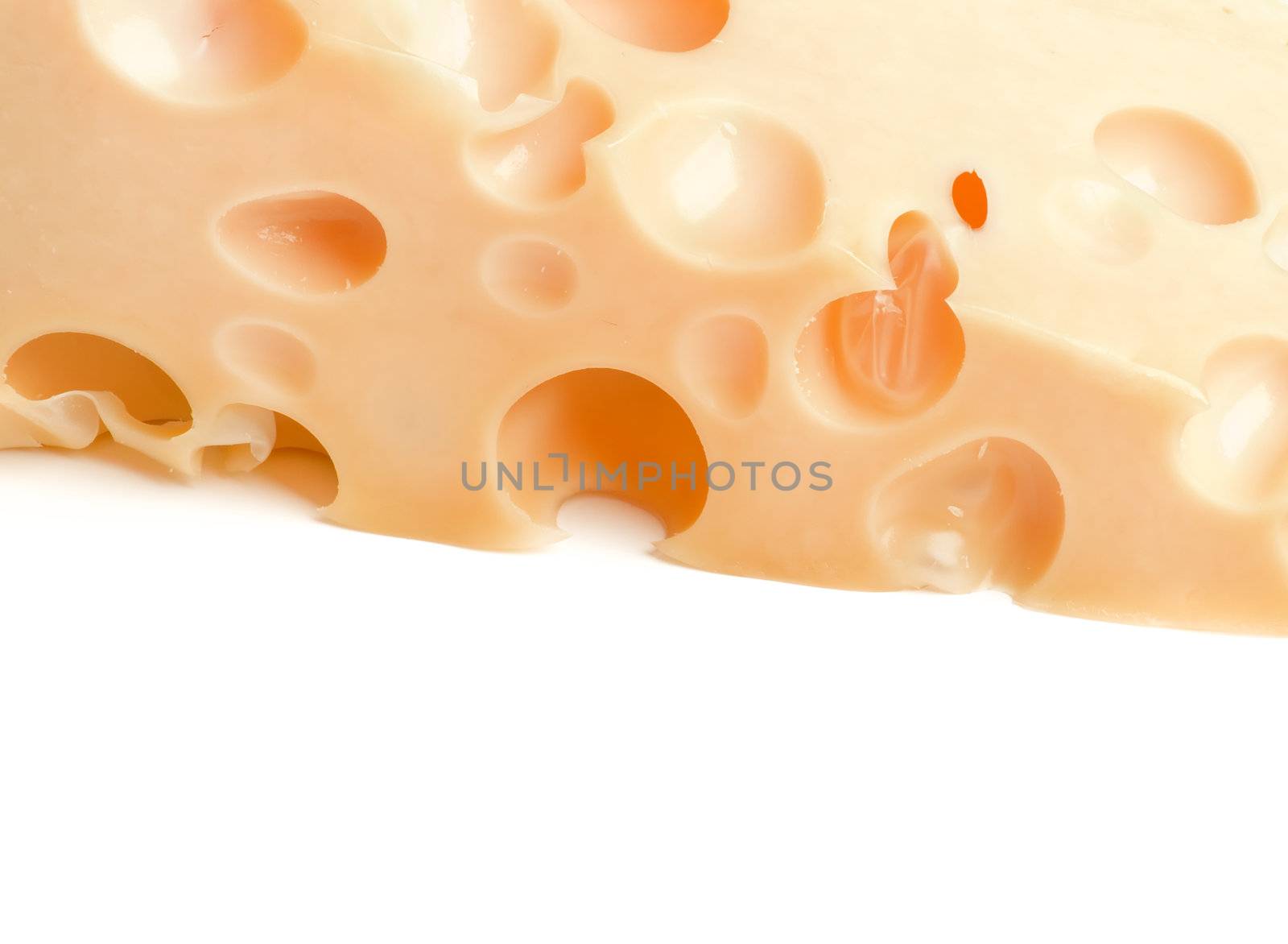 Frame of Perfect Emmental Cheese closeup isolated on white background