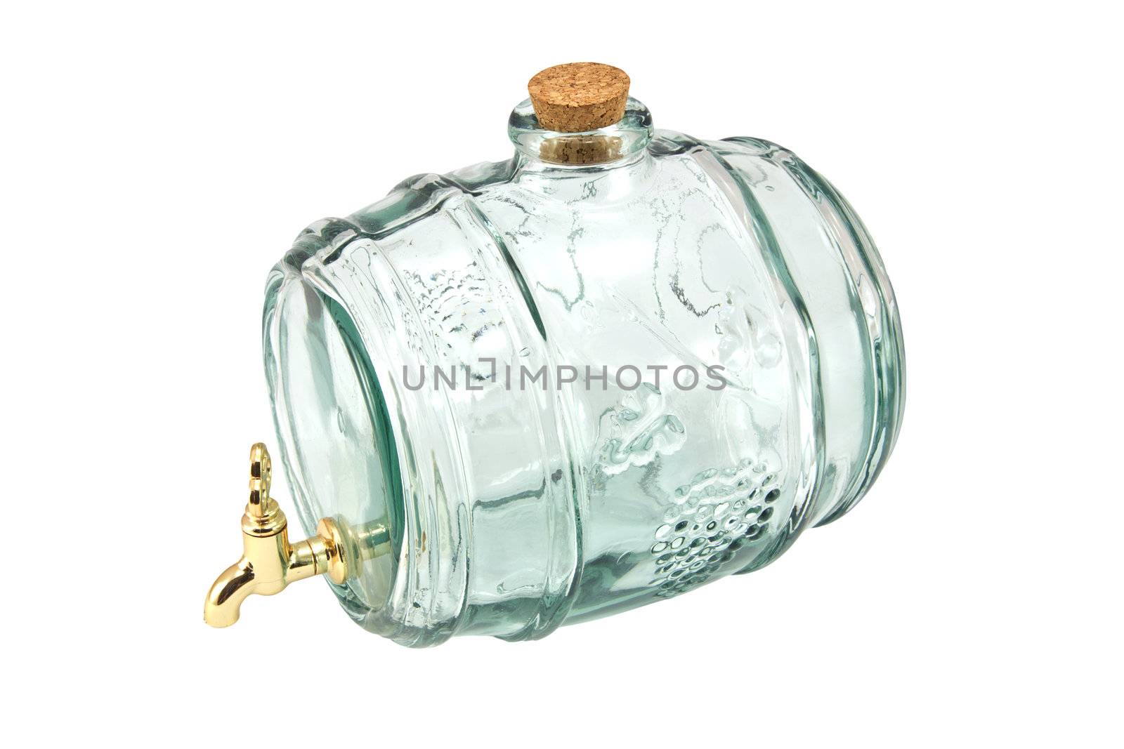 A barrel-shaped glass decanter isolated on white