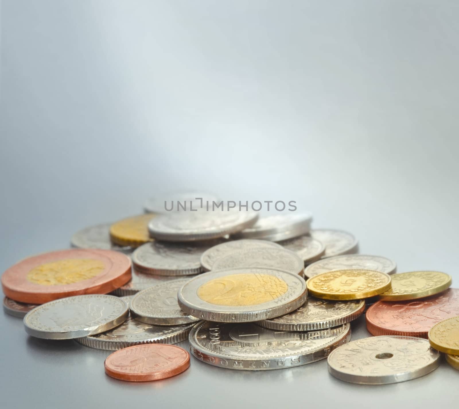 Coins from europe and asia. Yen,yuan,euro,krone,swiss franc,cent.