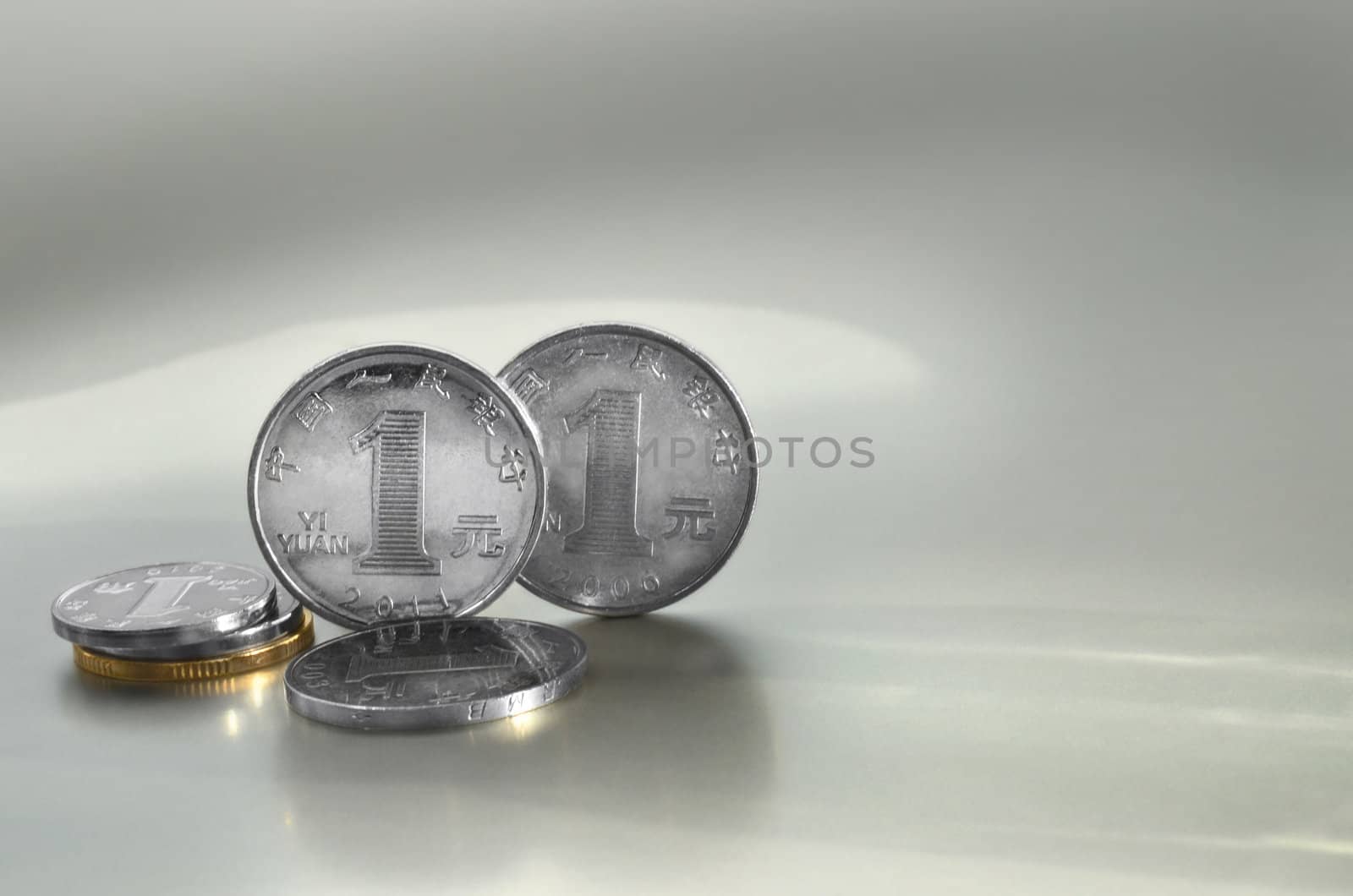Few chinese coins on light background