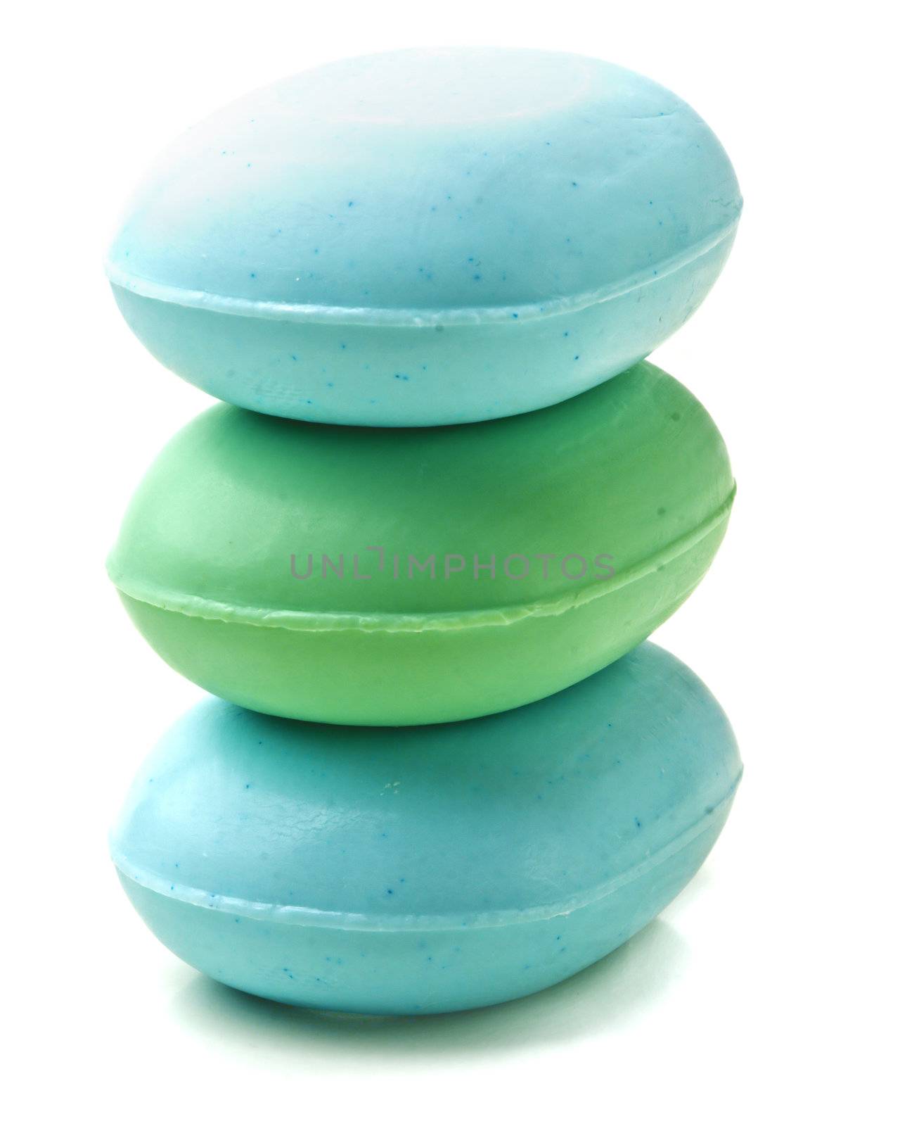 Stack of new colorful Soap Bars on white background.