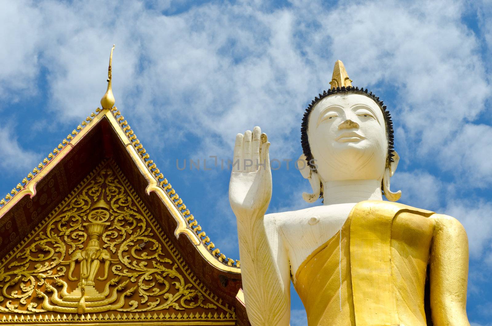 Buddhist temple and Buddha statue in Vientiane, Laos.