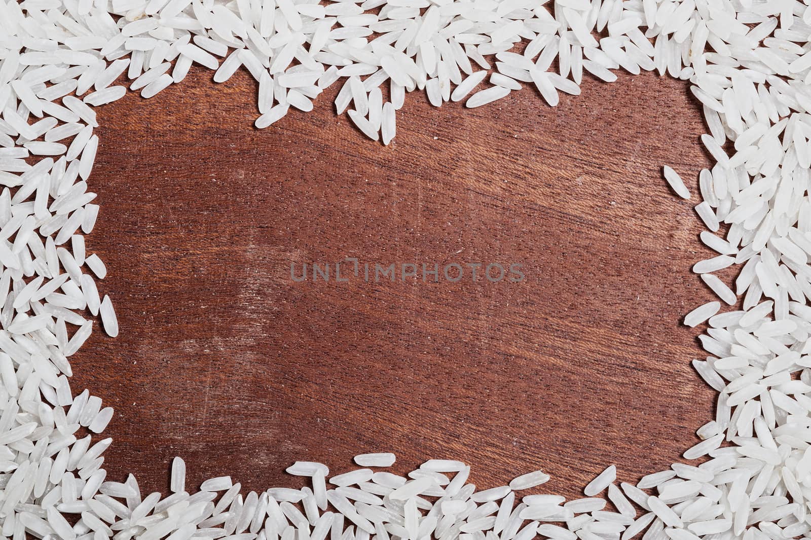 Rice background on wooden table