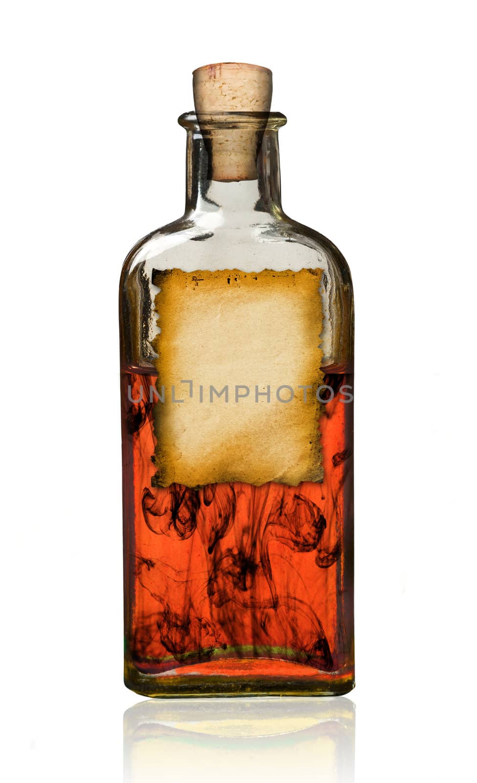 Old fashioned drug bottle with label, isolated, clipping path. 