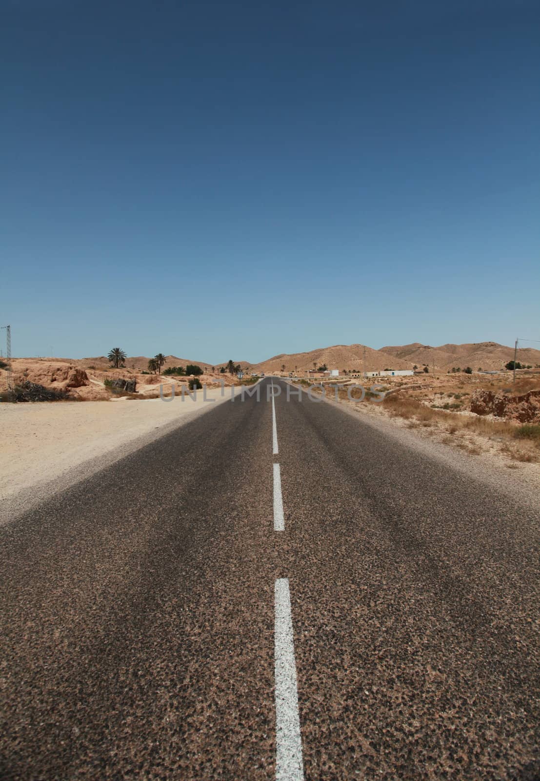 lonely desert highway the sahara desert, north africa