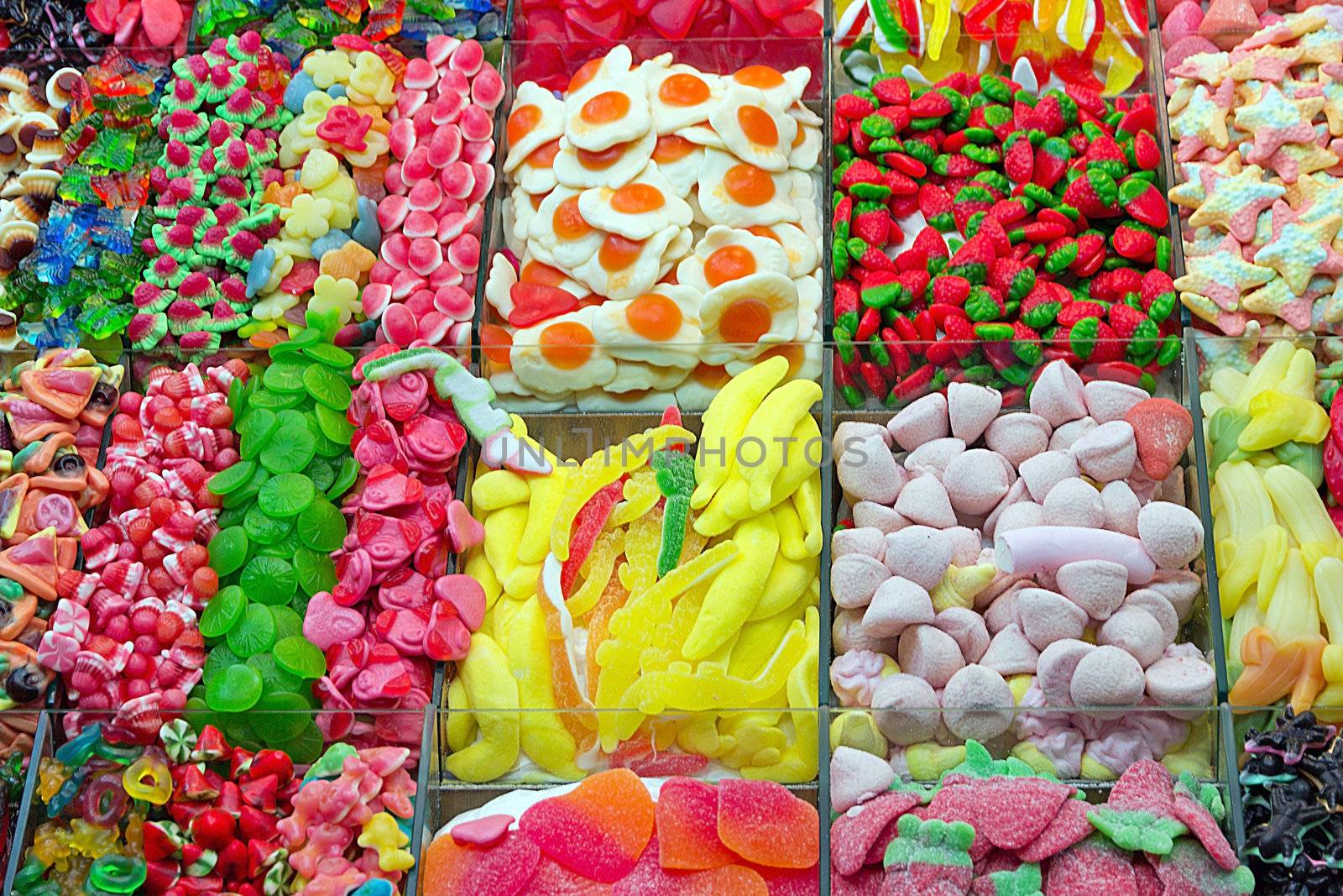 Mixed colorful sweetmeats candy background