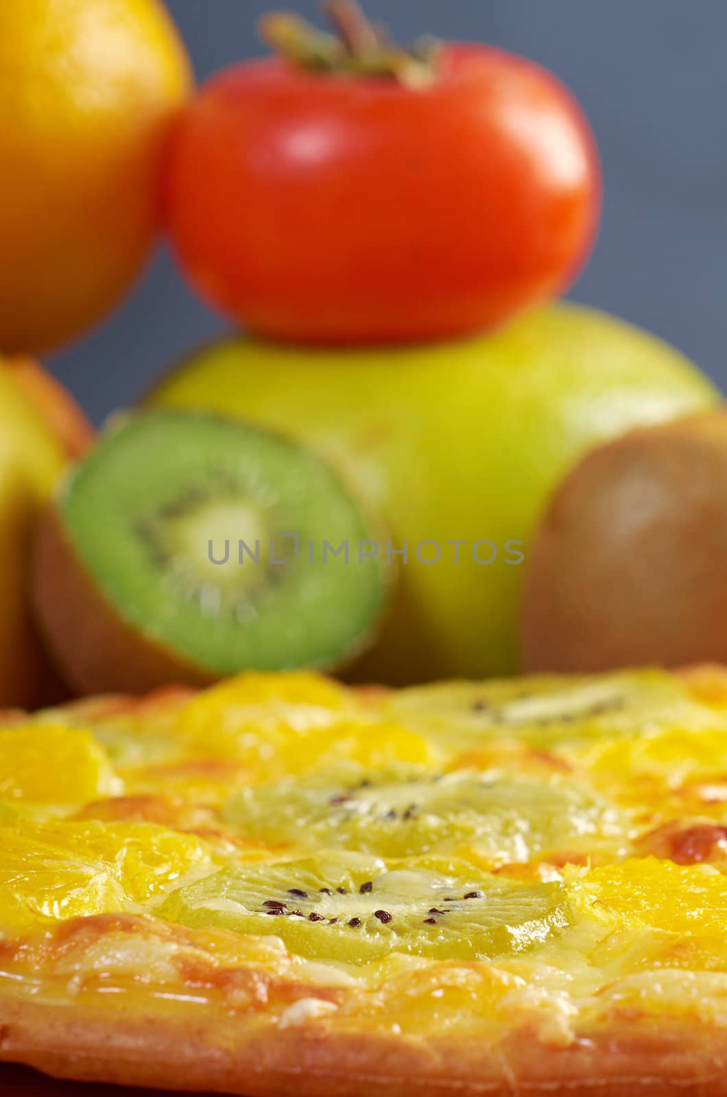 homemade sweet pizza with fruit.with orang kiwi,sauce