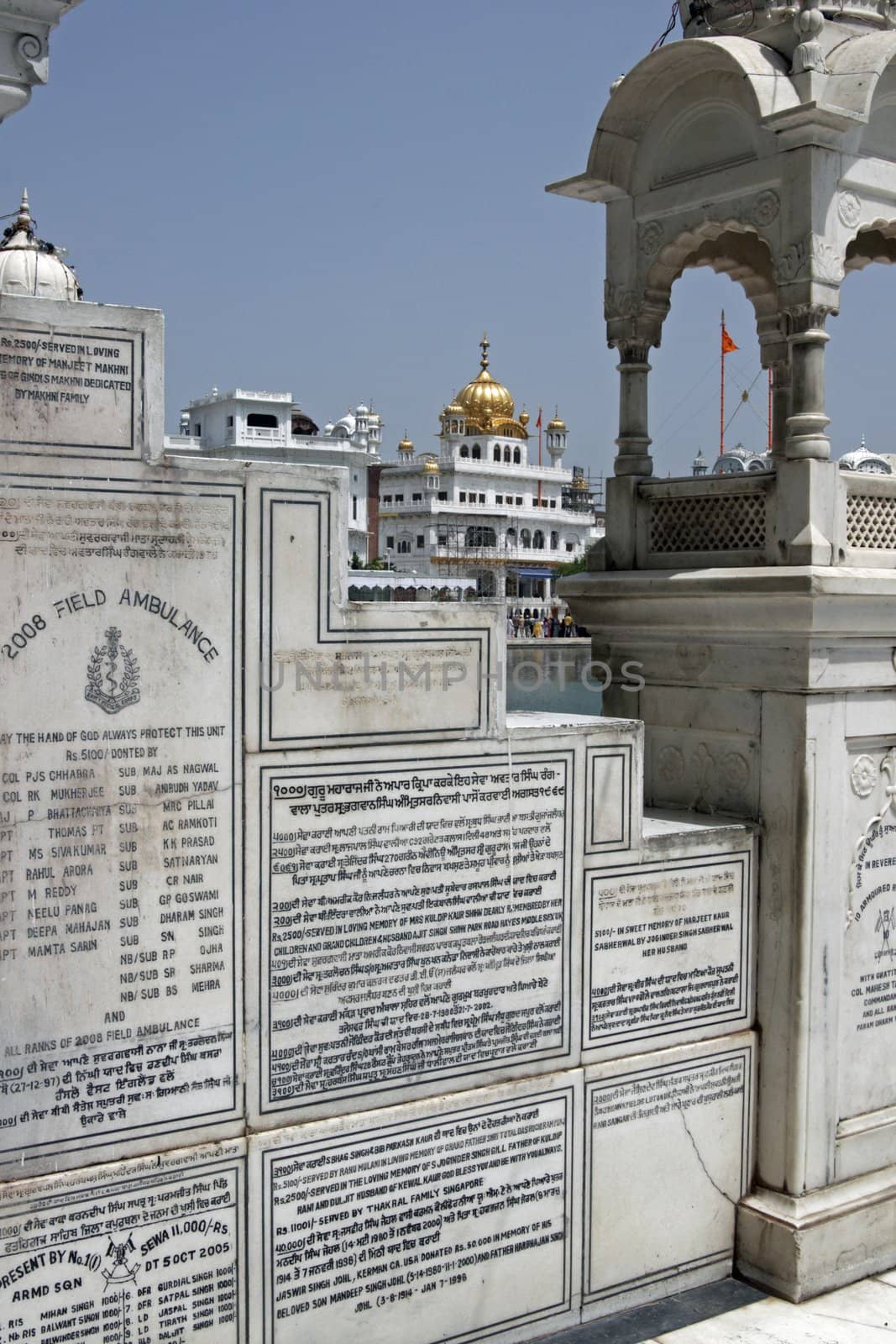Golden Temple. Holiest shrine of the Sikh religion. White marble inscribed with the names of Sikh's who have fallen in battle. Amritsar, Punjab, India.