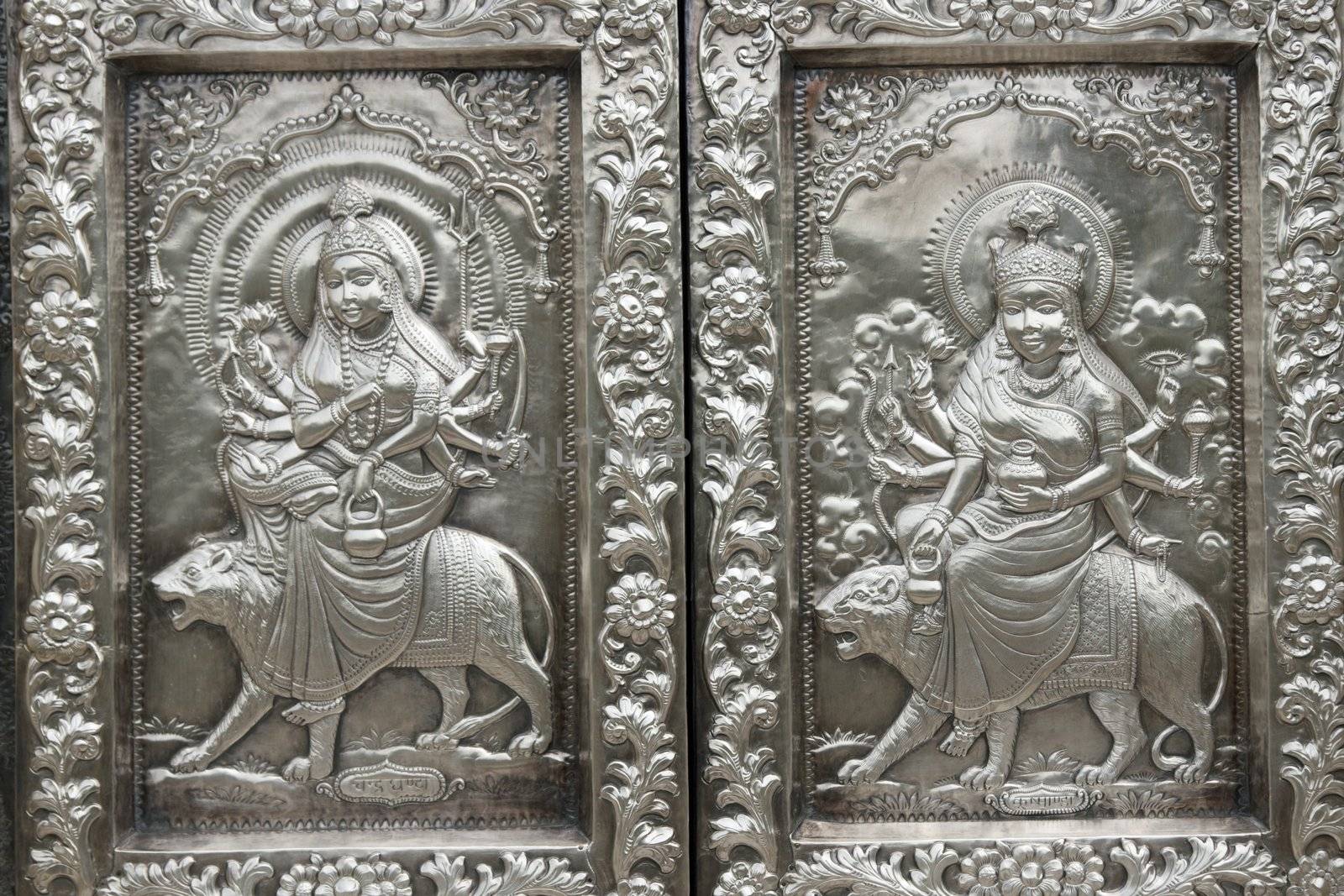 Durgiana Hindu Temple. Detail of ornate silver panels decorating the door to the inner sanctum. Amritsar, Punjab, India