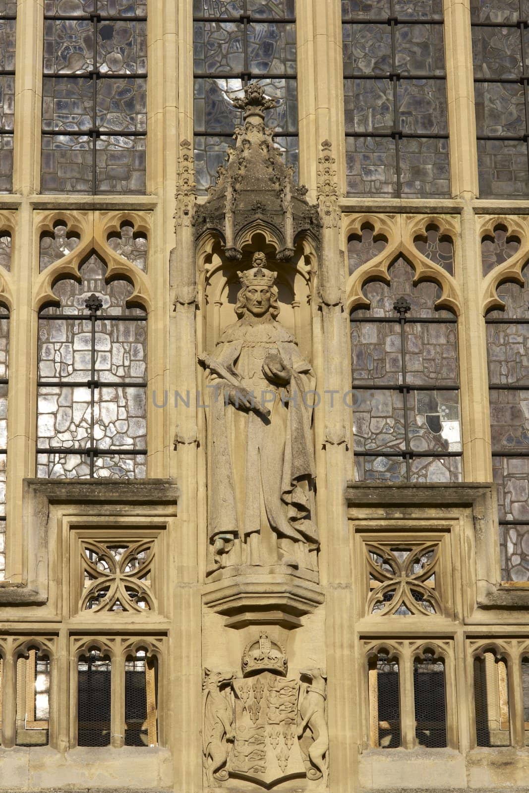 Detail of religious statue on the west front of Bath Abbey. 16th Century church, Bath, England, United Kingdom