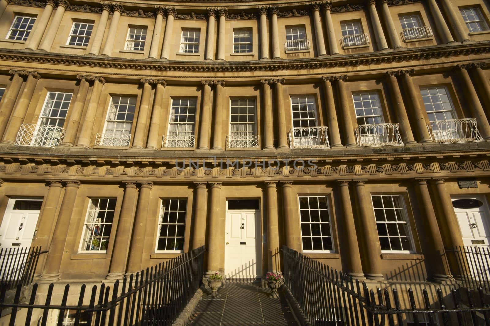 House in the historic Royal Crescent. Large crescent of houses made from locally mined bath stone. Bath, Somerset, England