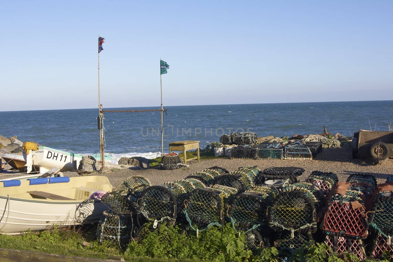 Lobster pots in the coastal fishing village of Beesands in Devon, England