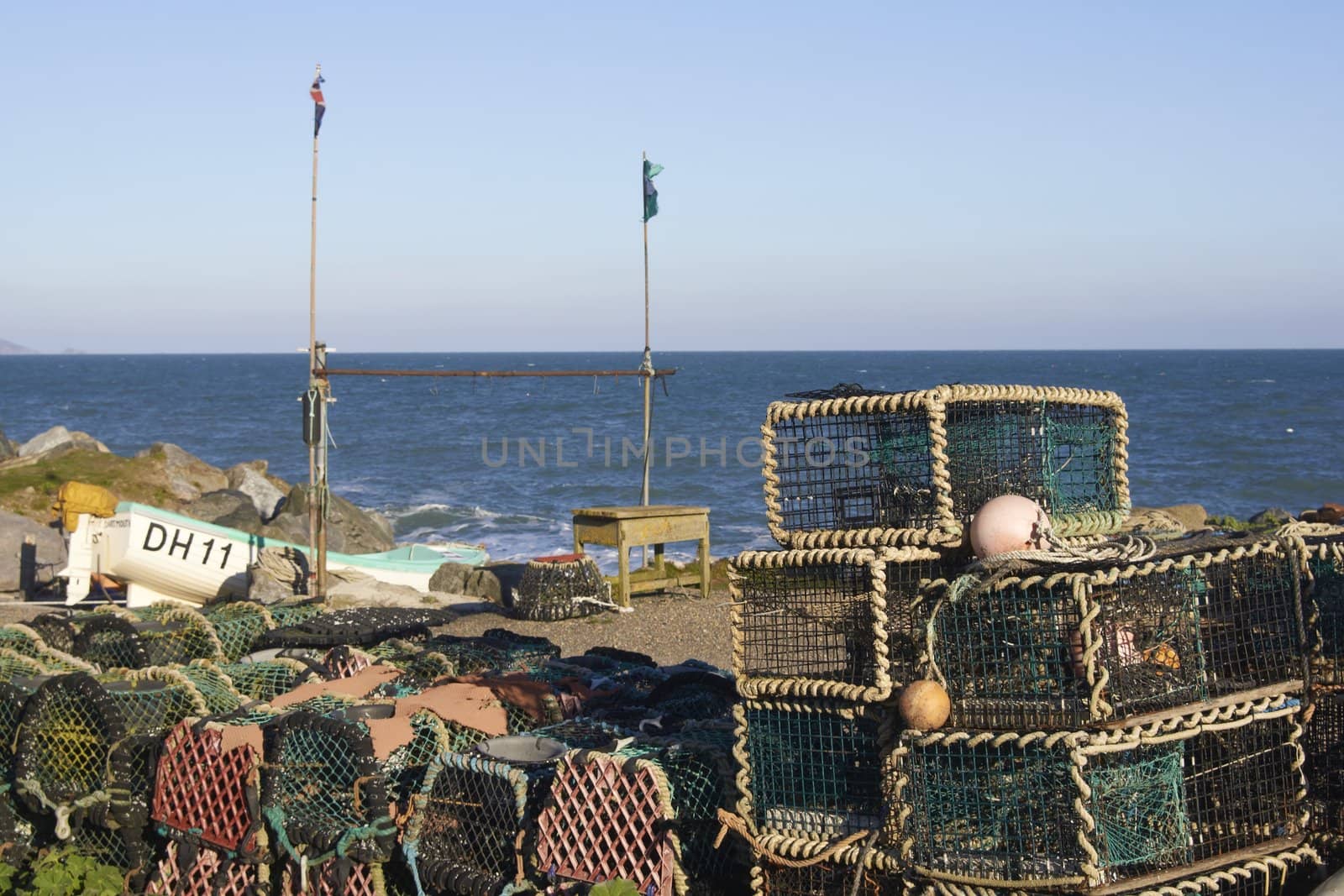 Lobster pots in the coastal fishing village of Beesands in Devon, England