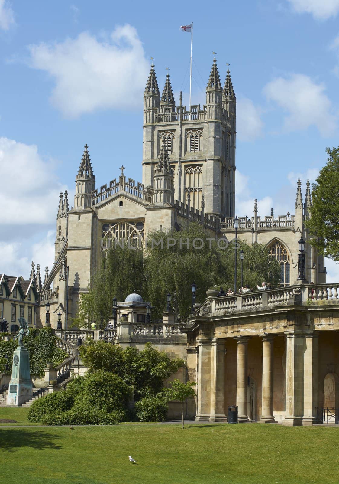 Bath Abbey standing tall above Parade Gardens in Bath, Somerset, England
