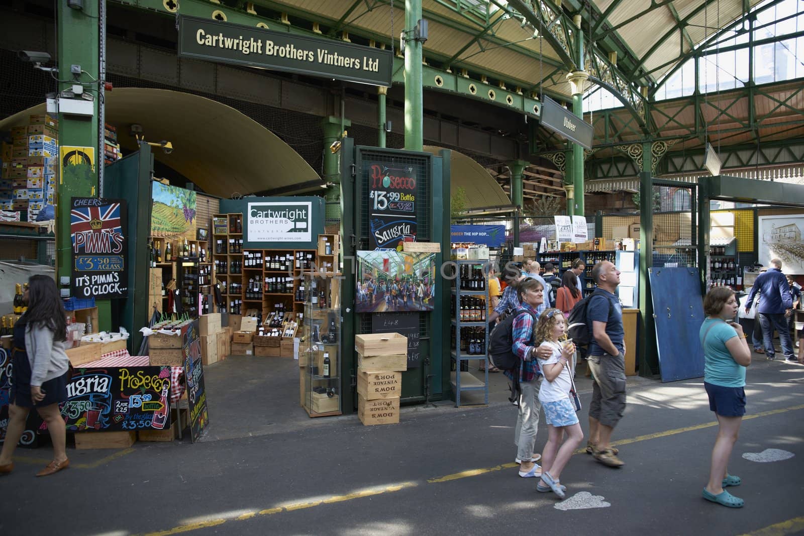 Shopping at the historic Borough Market in Southwark, London, England.