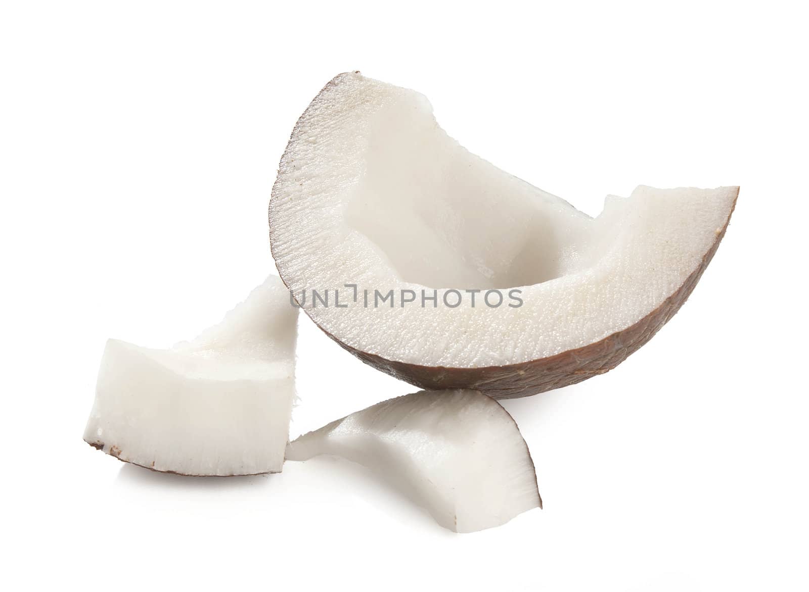Pieces of coconut's pulp on the white background